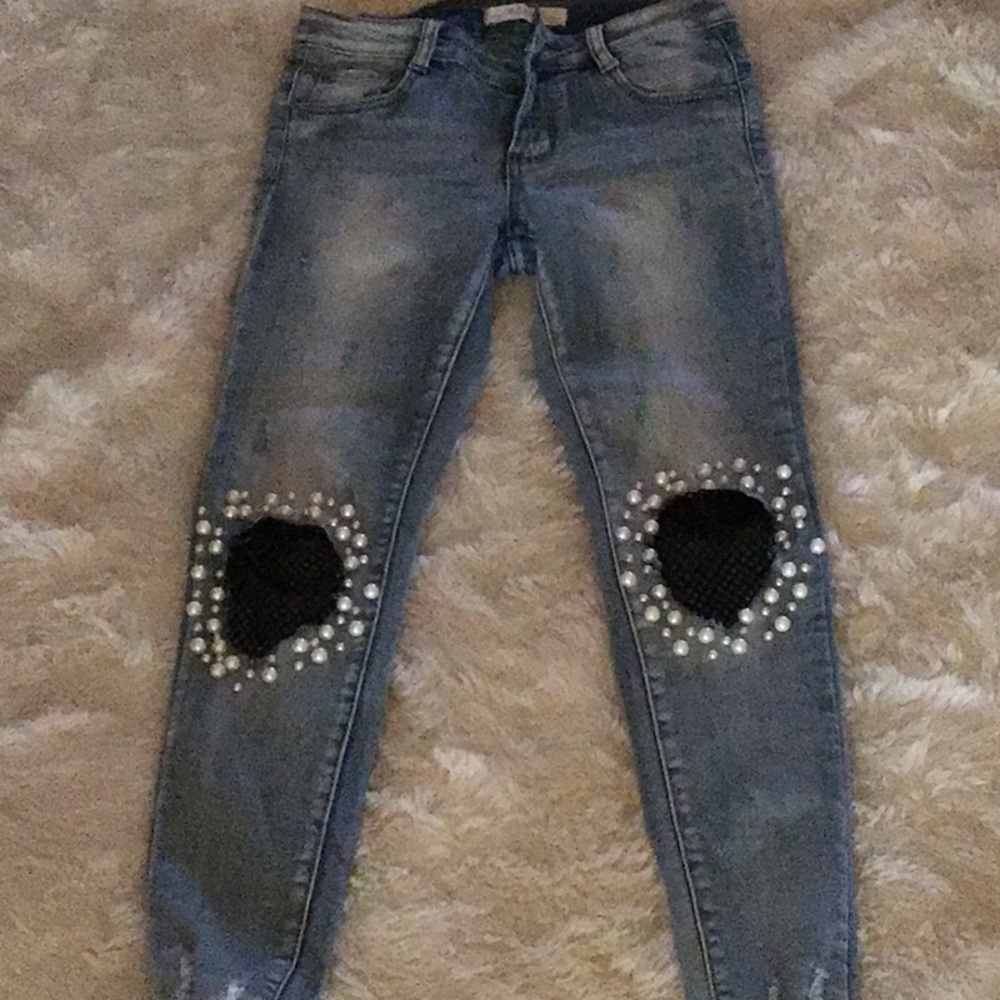 Detailed:Pearls and overlay jeans